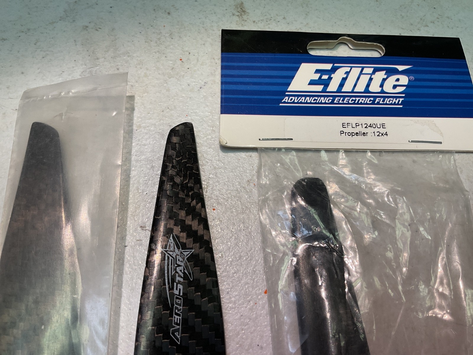 2 ea. AeroStar Carbon Fiber 12×6 E Props and 2 ea. E-Flite 12×4 E Props.