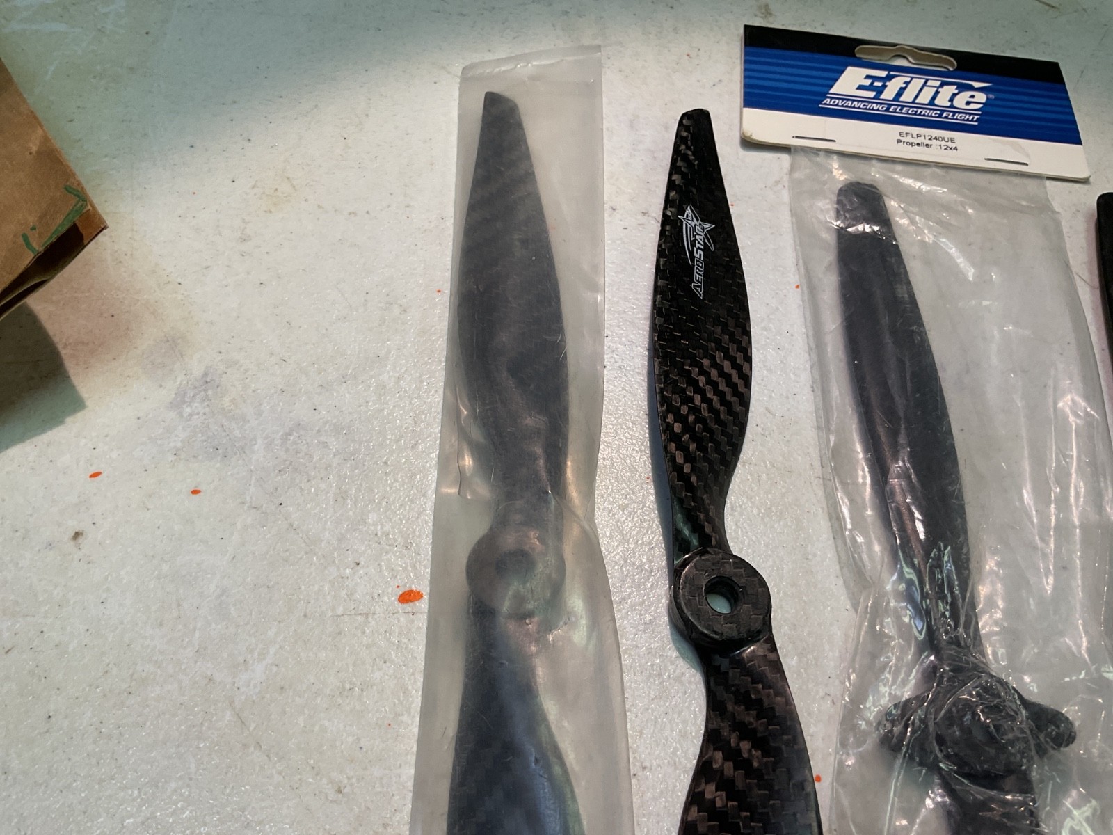 2 ea. AeroStar Carbon Fiber 12×6 E Props and 2 ea. E-Flite 12×4 E Props.