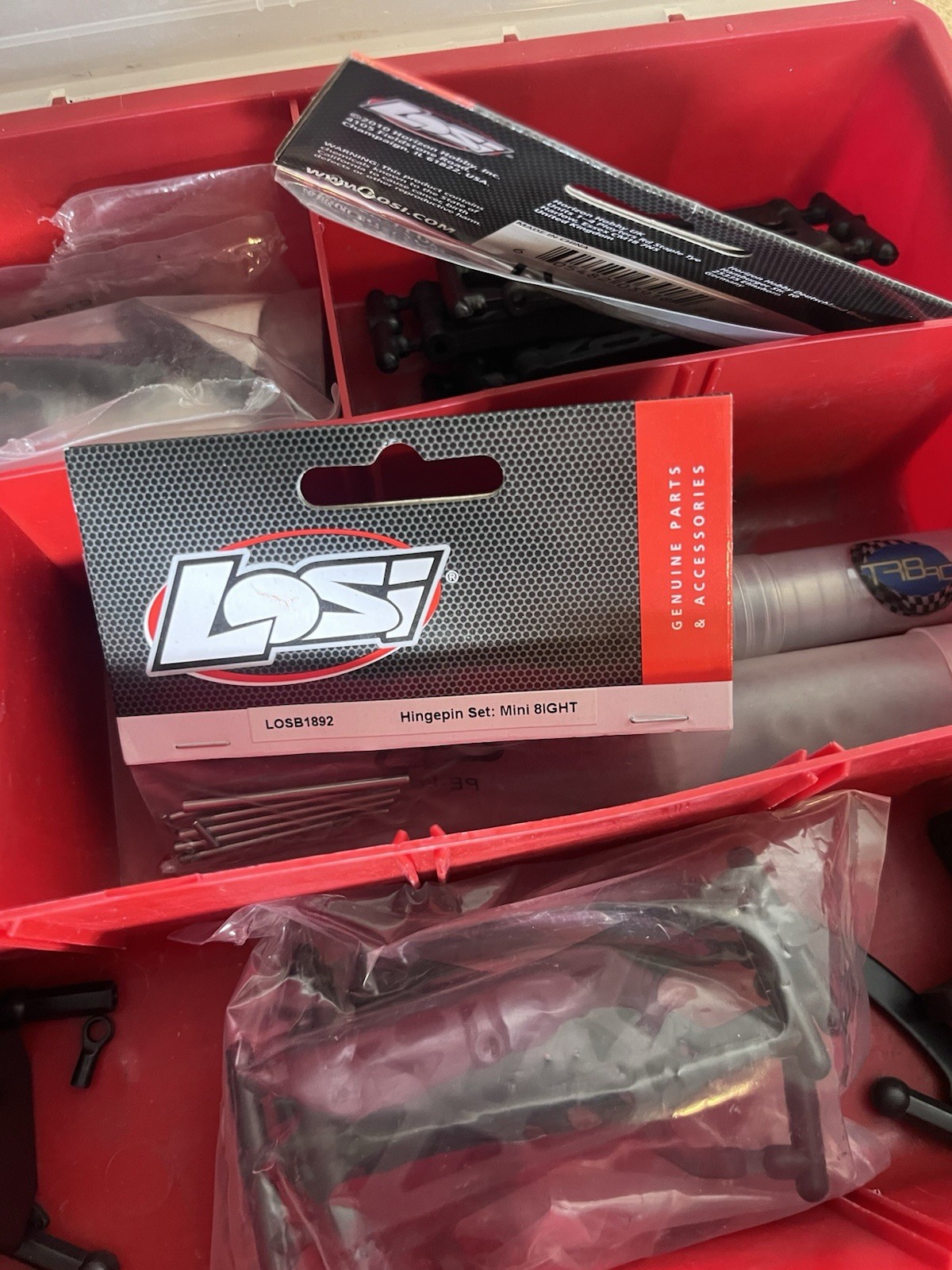 Lot Of RC Car Parts Including Loci And Tacon Brands Items As Shown